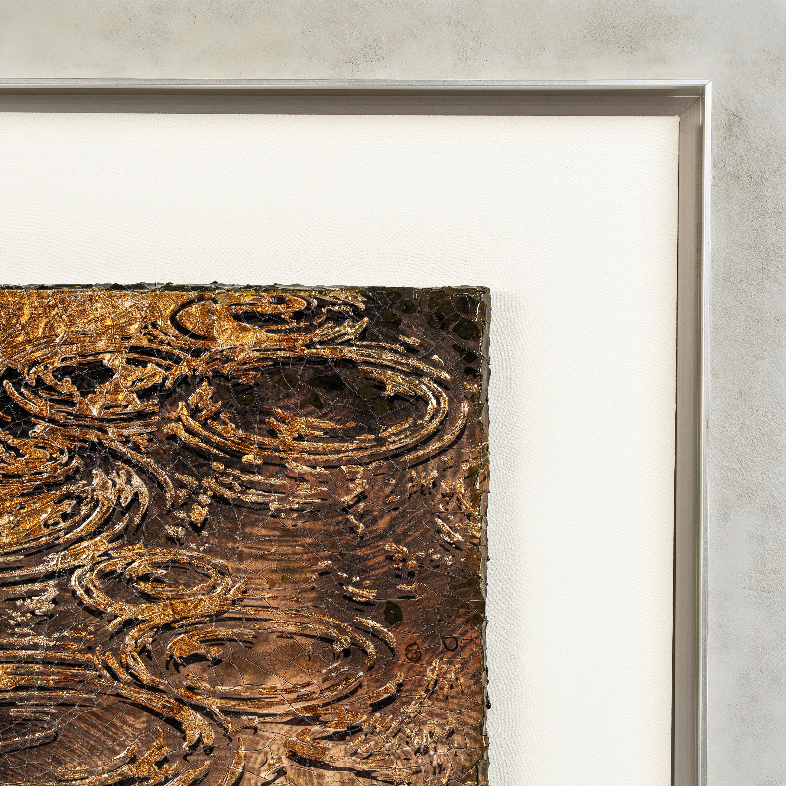 Corner detail of Harvest Tide — Patinated Foil · Aura Frame, revealing the two distinct gestures of the water element surface — natural crackle fissures formed through mineral curing and hand-worked 3D ripple relief — with fired foil tracing the wave contours.