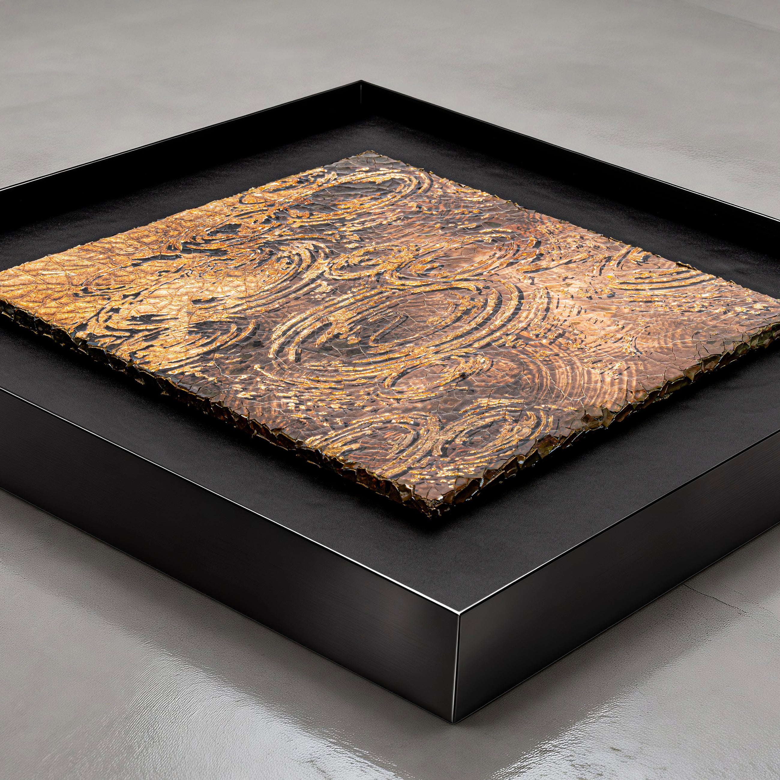 Flat-lay overhead view of Harvest Tide — Patinated Foil · Aura Frame, capturing the full expanse of its 3D water element mineral terrain as concentric wave ridges gather and spiral upward, the heat-graduated foil catching light across crackle texture throughout.