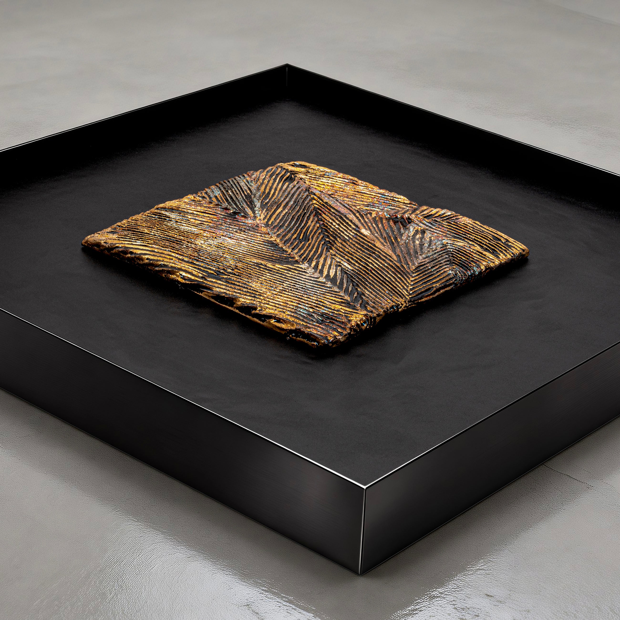 Flat-lay overhead view of Striae — Patinated Foil · Aura Frame, capturing the full expanse of its 3D metal element mineral surface — directional crackle fissures and metallic foil striations running in parallel across the rough, mottled terrain of fractured earth and fired ore.