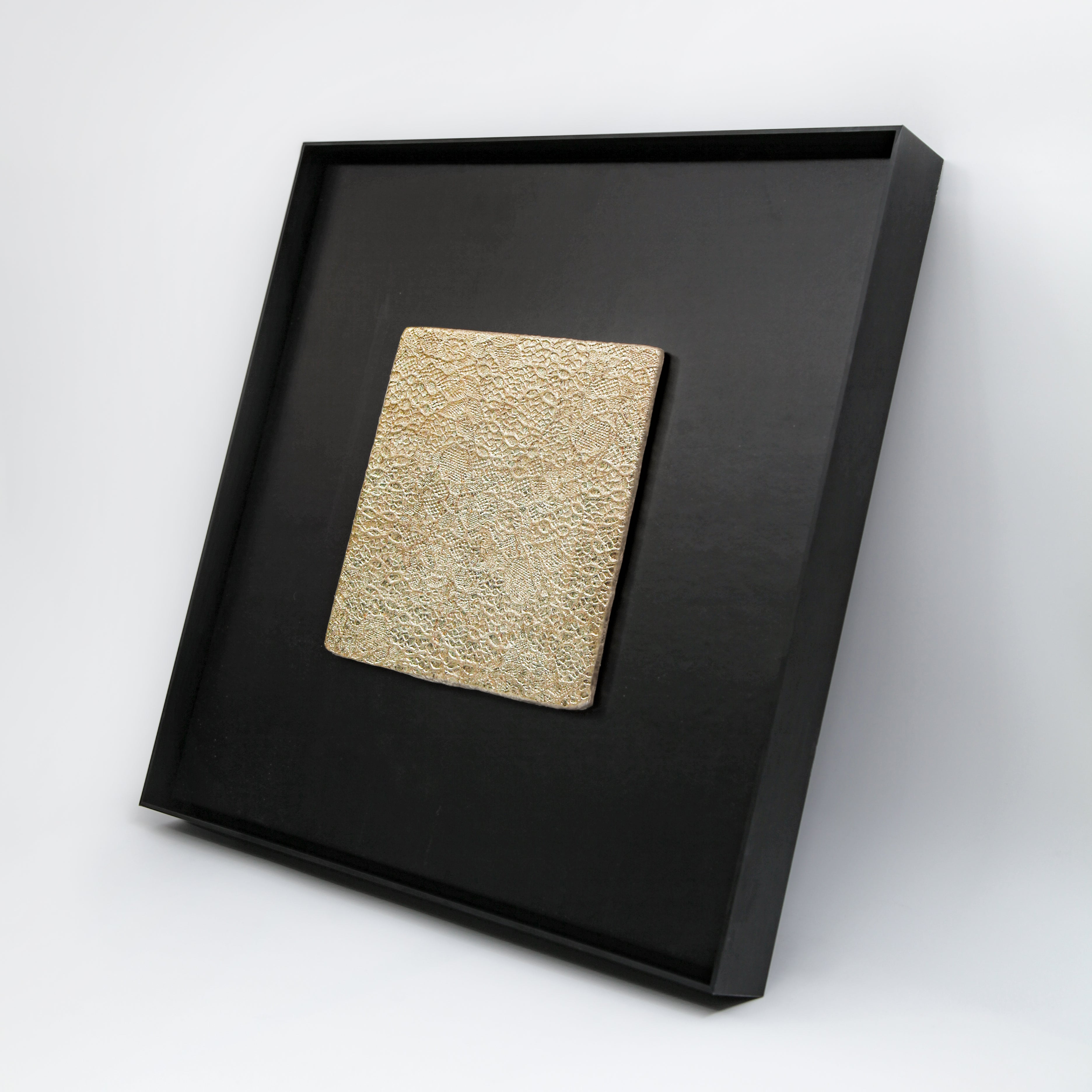Tendril — Gilded Foil · Aura Frame, full view of a wood element wall art where vines and unfurling leaves are pressed upward by hand from mineral pigment, Eastern Jin Dynasty gilded foil beaten to 0.1 microns weaving through the green-brown terrain like sunlight through a forest canopy.